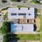 photo par drone du Pôle enfance en Mai 2026 au moment de sa livraison. Chantier biosourcé de Petit-Mars : suivi de chantier en paille et terre crue.