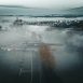 Passerelle de Sablé-sur-Sarthe dans la brume au lever du jour, image du film de chantier par drone